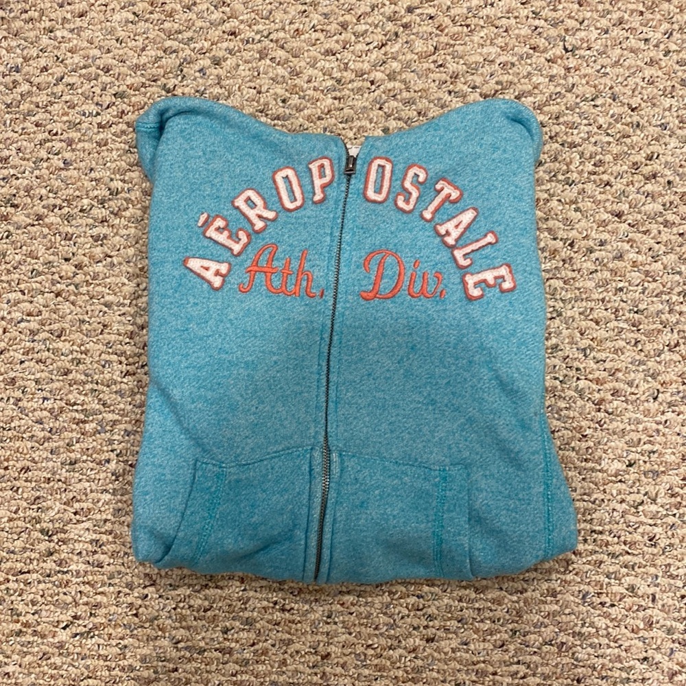 Size M Aeropostale zip up sweatshirt. Teal blue color with orange & white detail